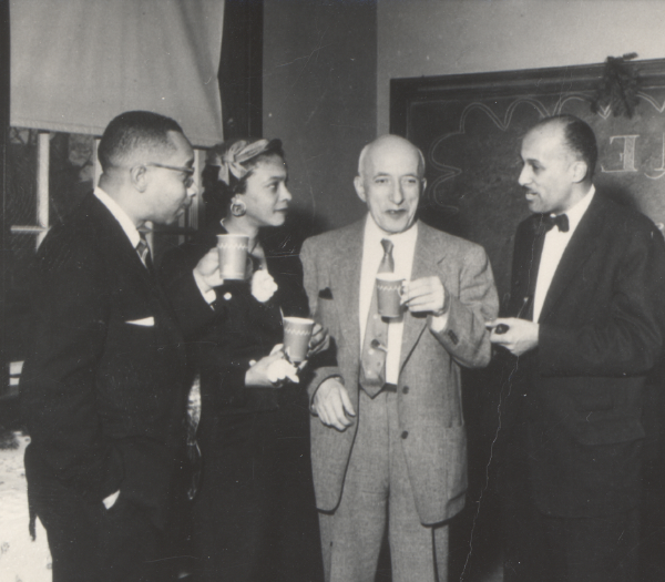 Archival photo of psychologists enjoying coffee together